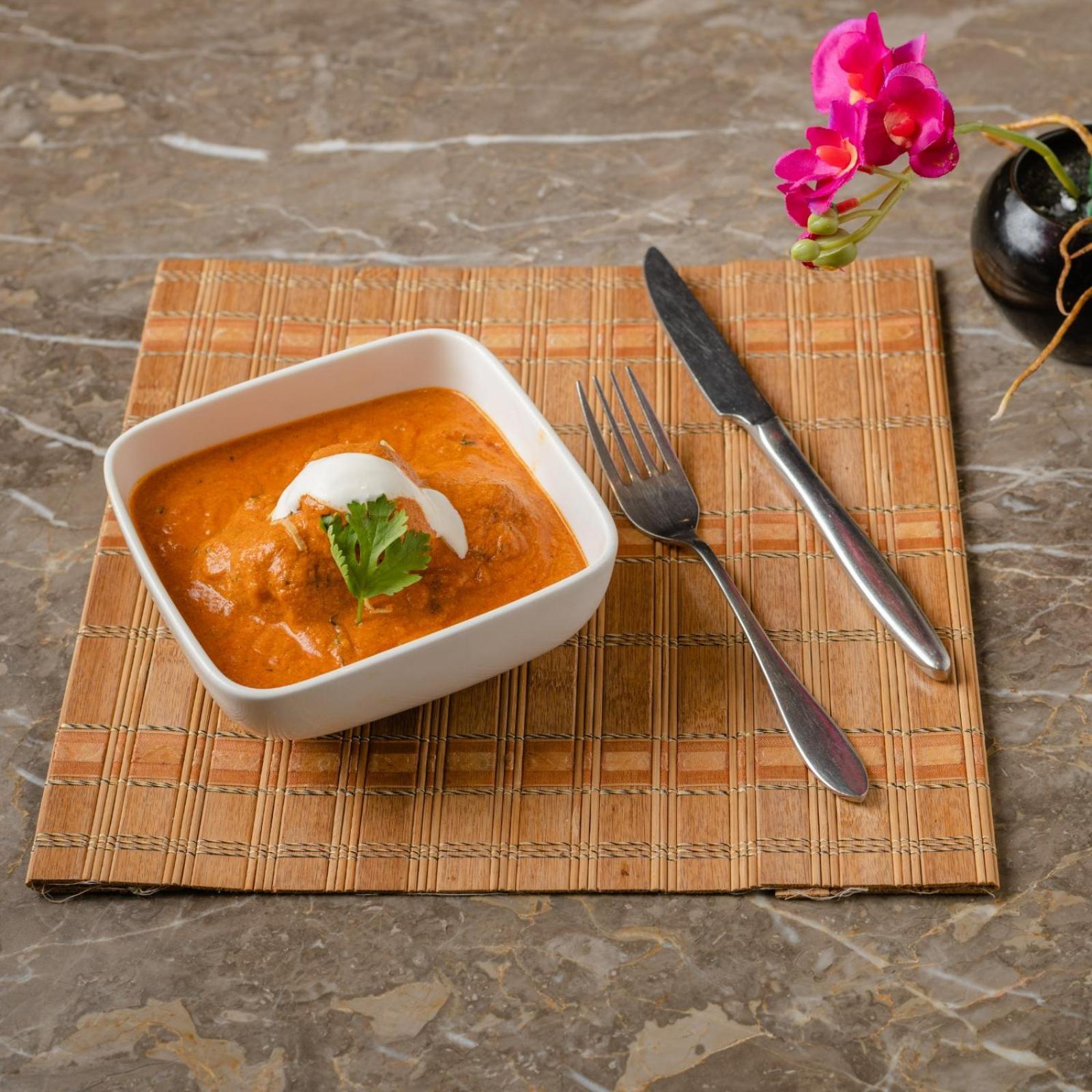 Southern Star,Maisur Dış mekan fotoğraf A bowl of butter chicken